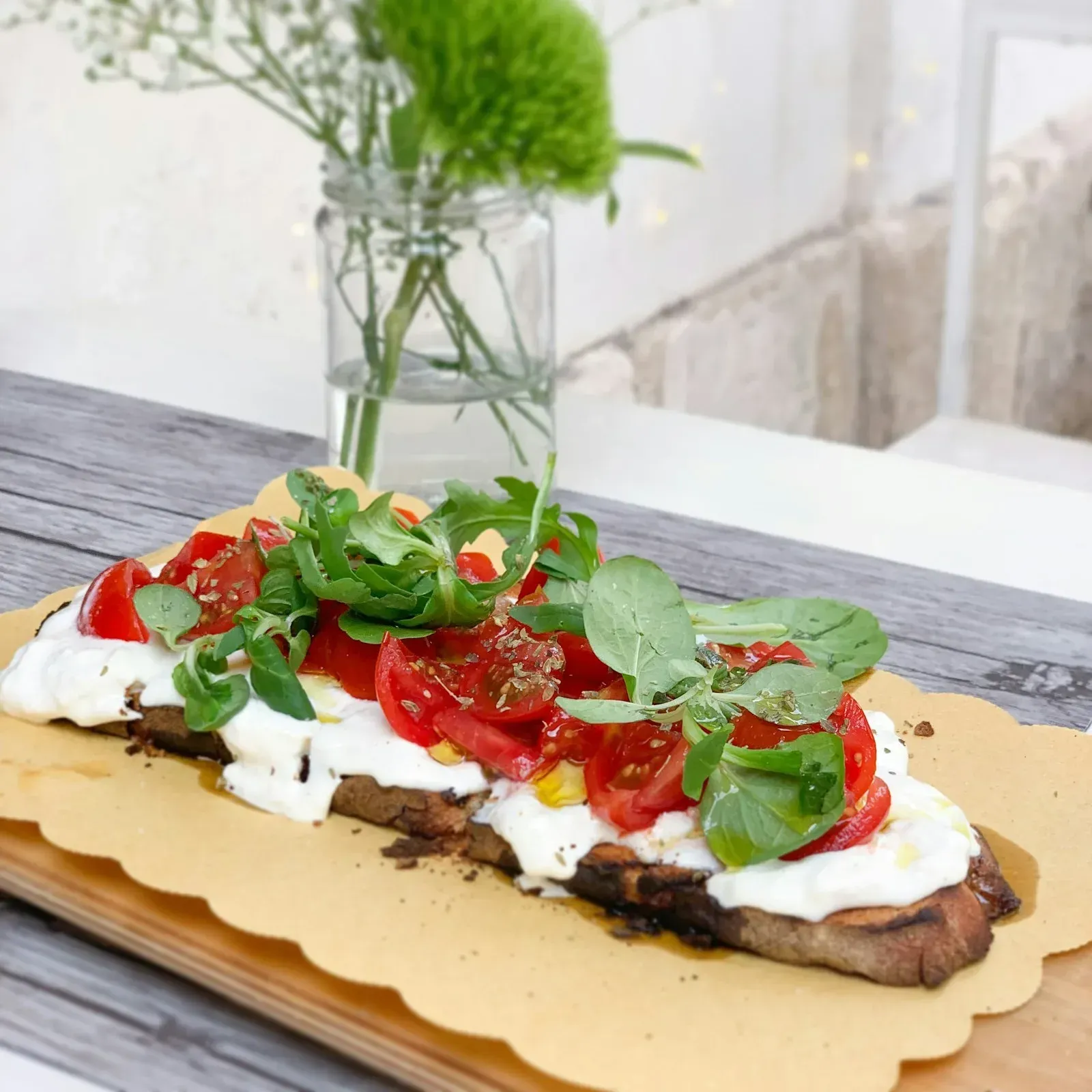 Burrata with fresh tomatoes and garden herbs