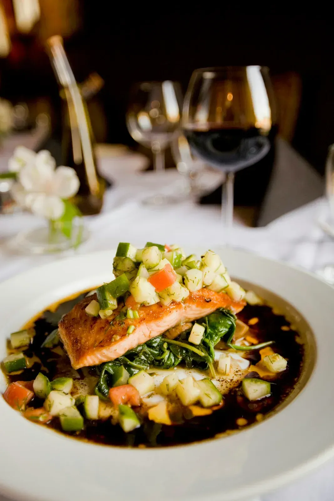 Salmon with colorful vegetables and herbs